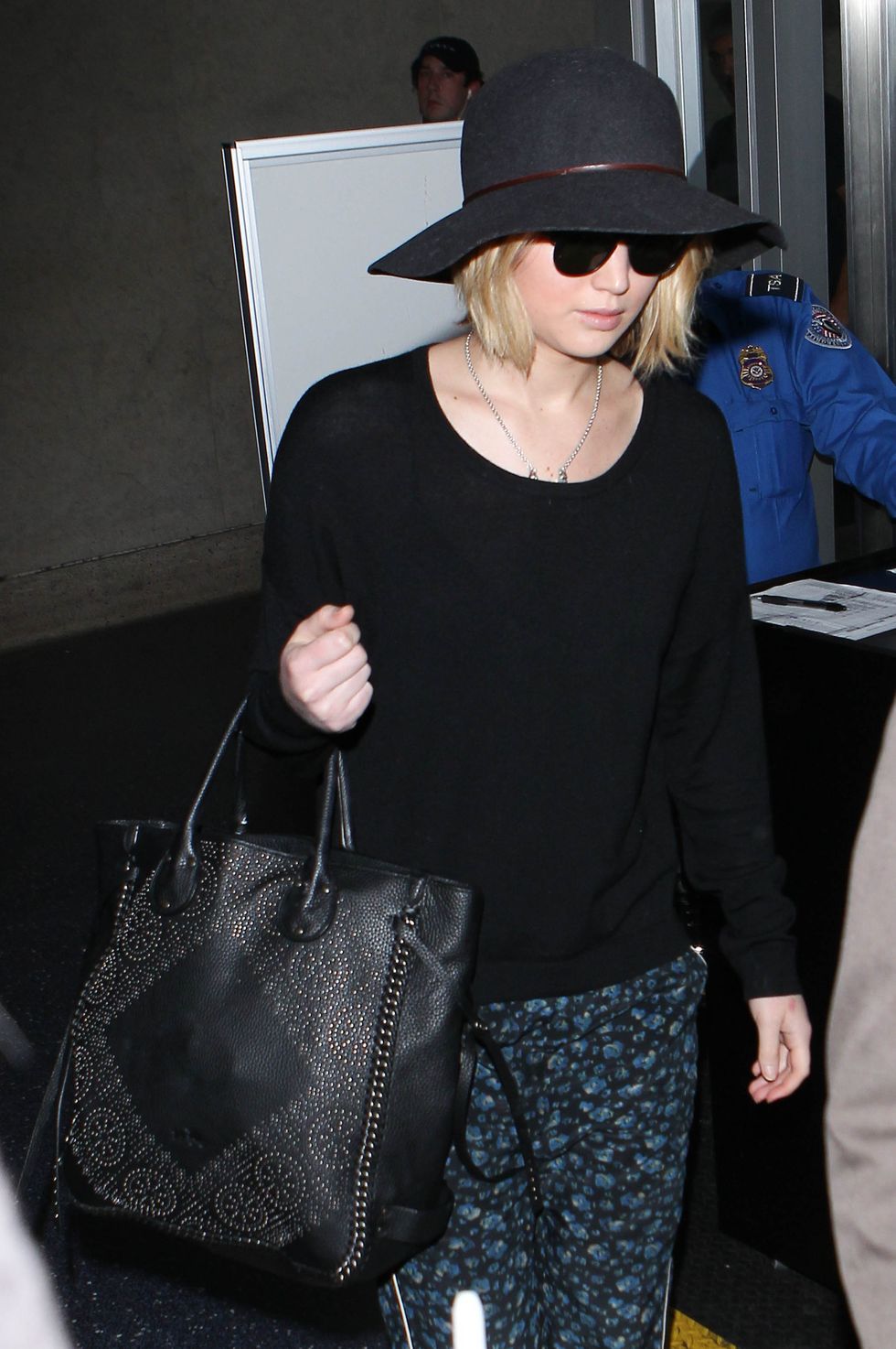 Jennifer Lawrence wears floral trousers to fly out of New York