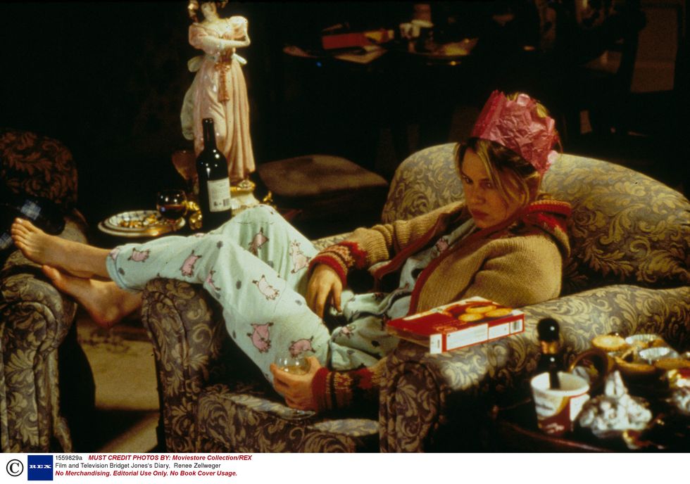 Bridget Jones in pyjamas and a christmas hat