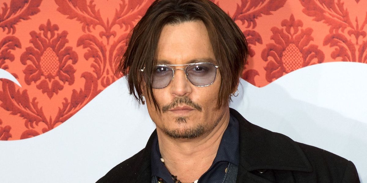 Johnny Depp branded "portly and unkempt" at Mortdecai premiere