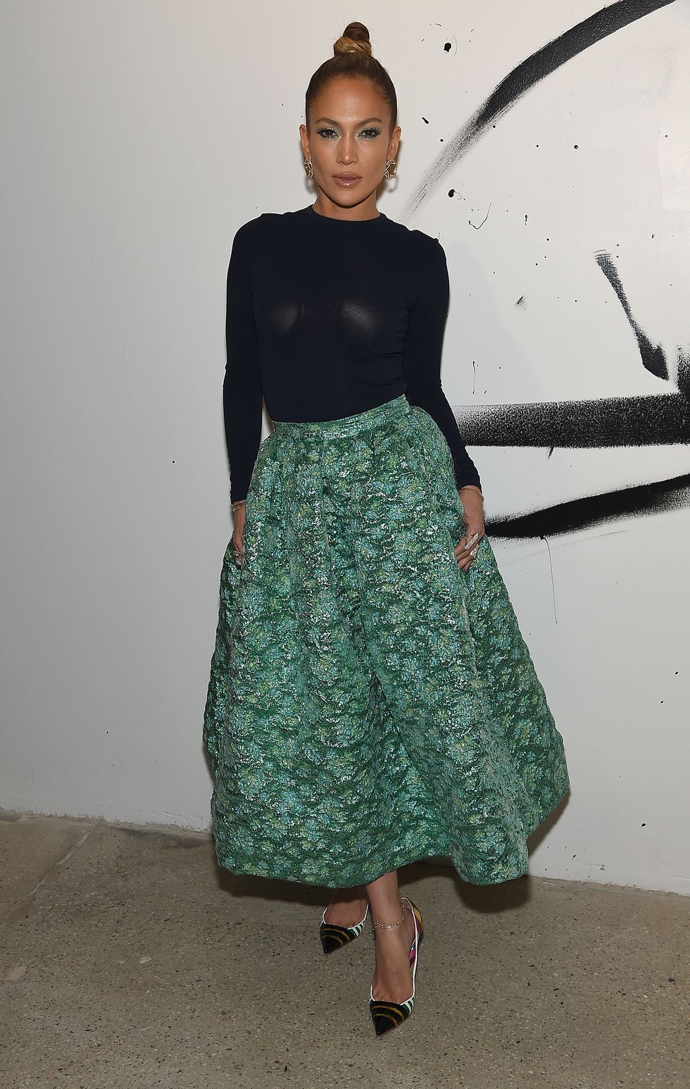 Jennifer Lopez wears green midi skirt
