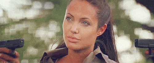 angelina shrug meh whatever don't care gif