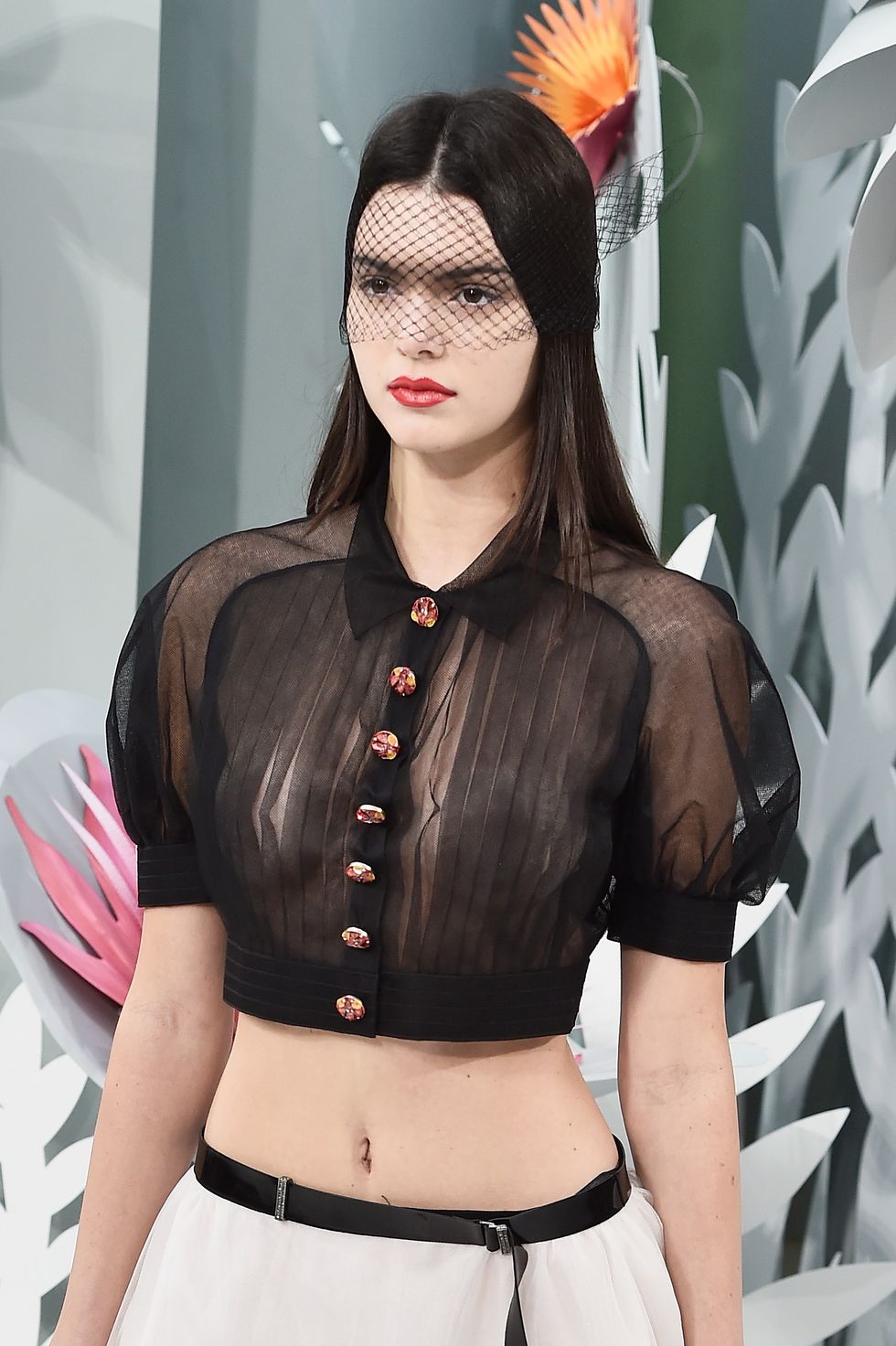 Kendall Jenner walking during Paris Haute Couture Fashion Week for Chanel SS15