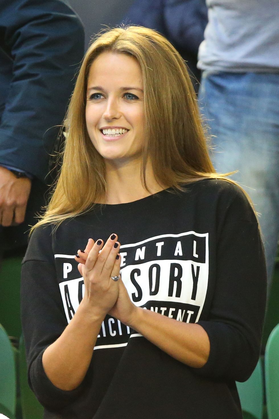 Kim Sears wears an explicit content sweatshirt at the Australian Open's final in response to that swearing controversy.