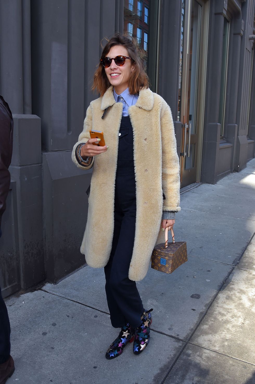 Alexa Chung out and about in New York in a teddy bear coat