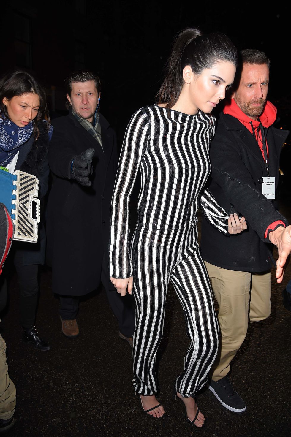 Kendall Jenner wears a striped jumpsuit in New York