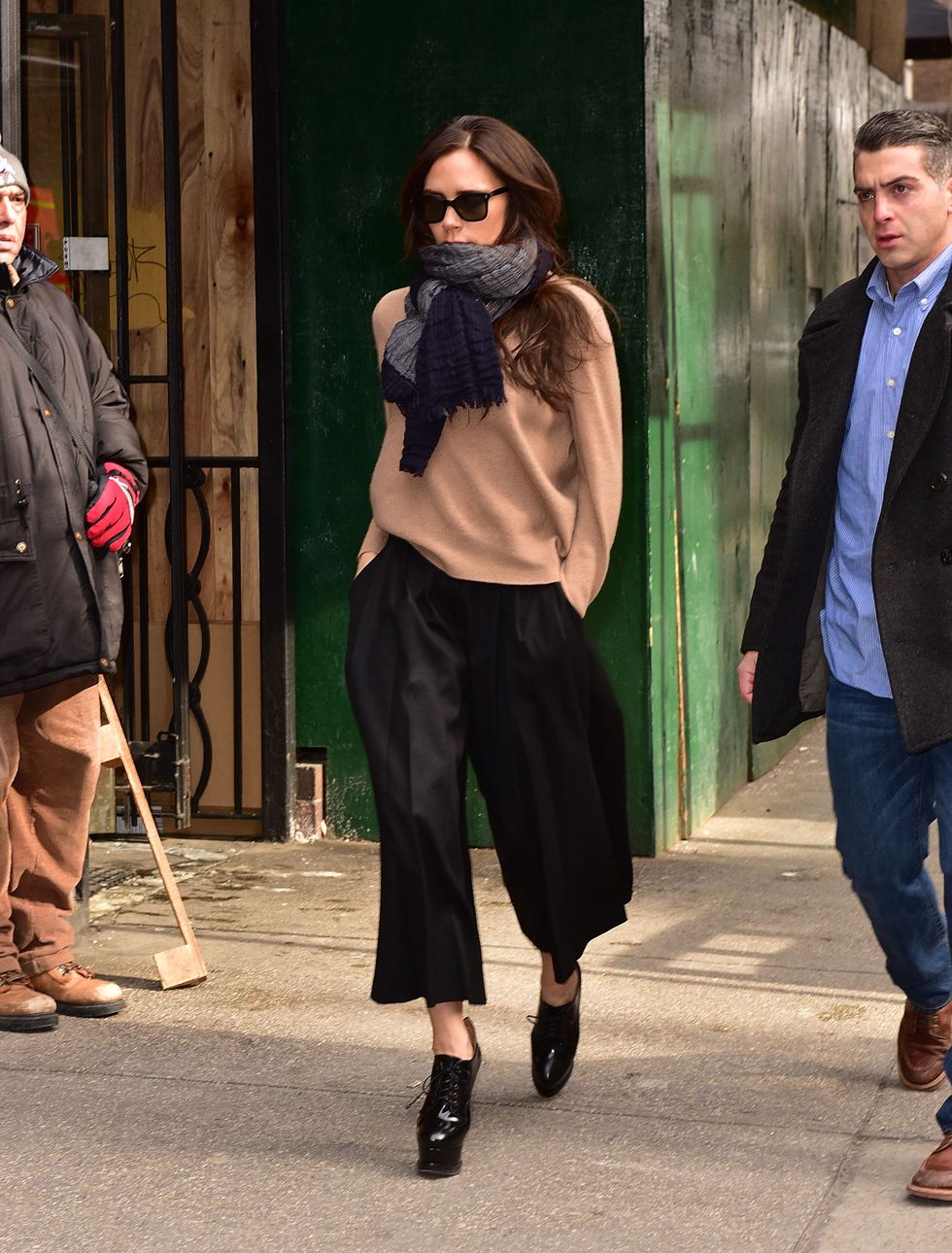 Victoria Beckham in New York wearing culottes and a scarf