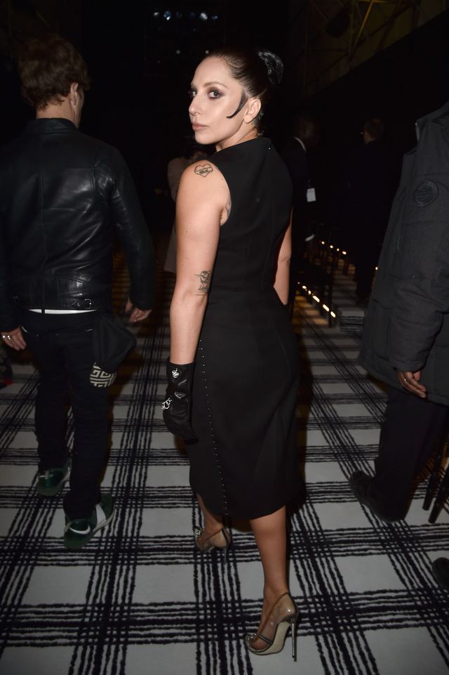 Lady Gaga wears a black dress at the Paris Fashion Week Balenciaga show