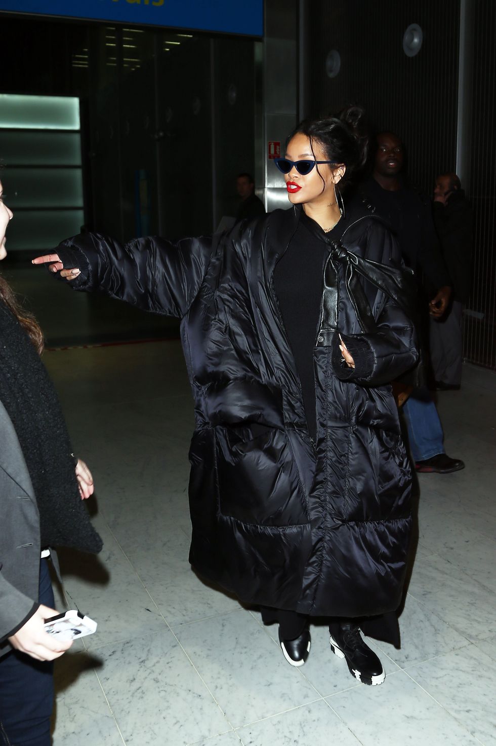 Rihanna wears the largest coat known to man in Paris