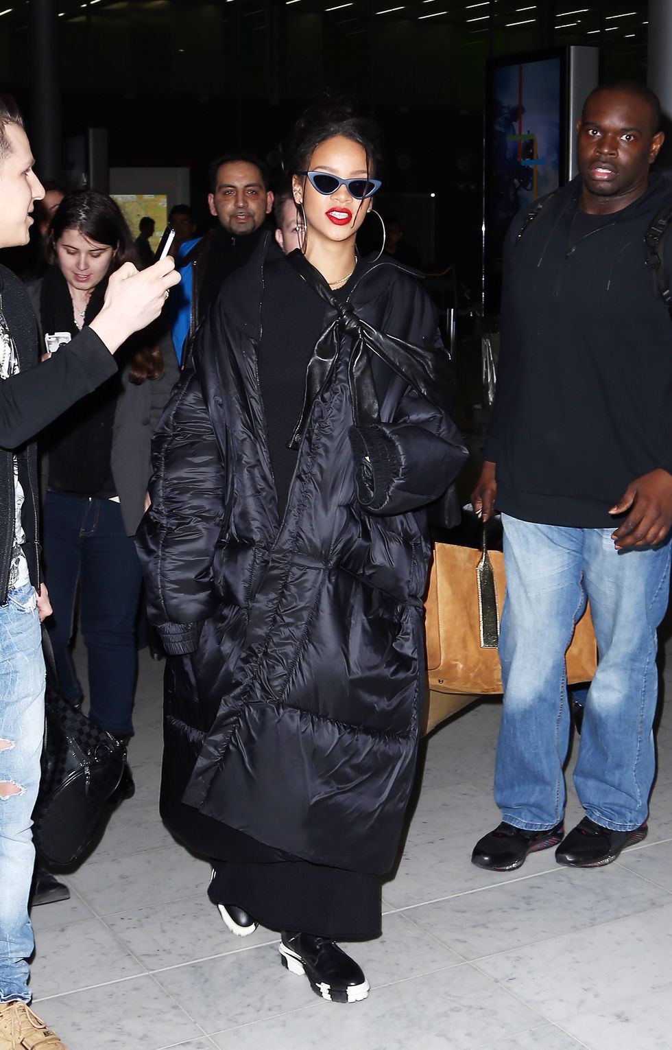 Rihanna wears a huge coat in Paris