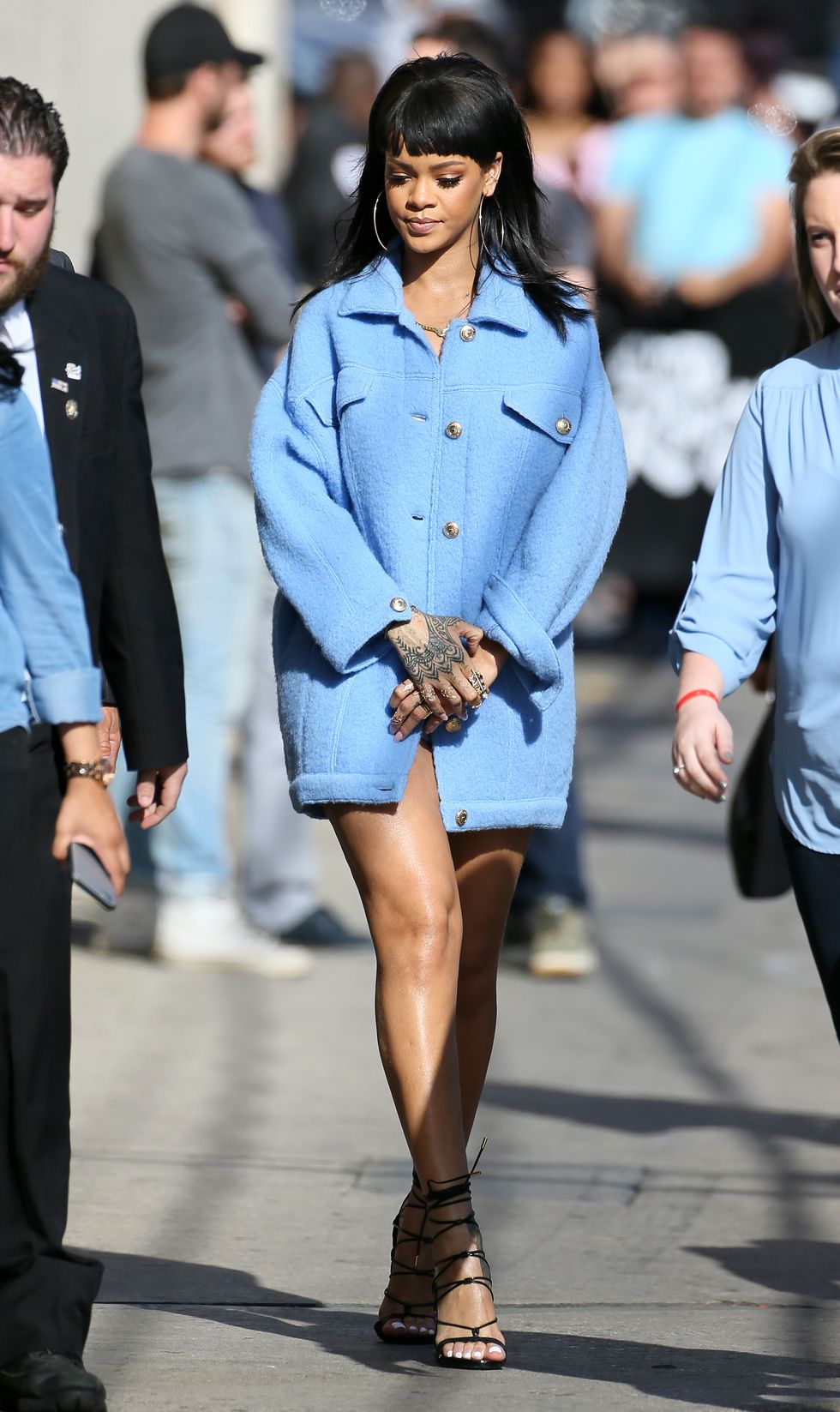Rihanna wearing a blue coat for Jimmy Kimmel Live appearance
