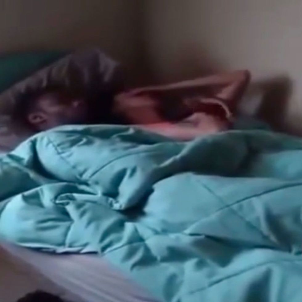 This man walked in on his girlfriend in bed with another man and filmed the  whole thing