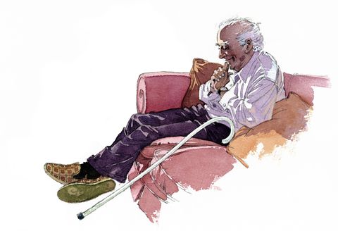 Elderly man sitting on the sofa - parent or grandparent