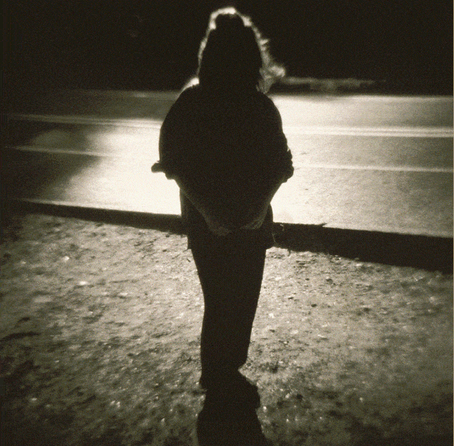 teenage girl in  the dark