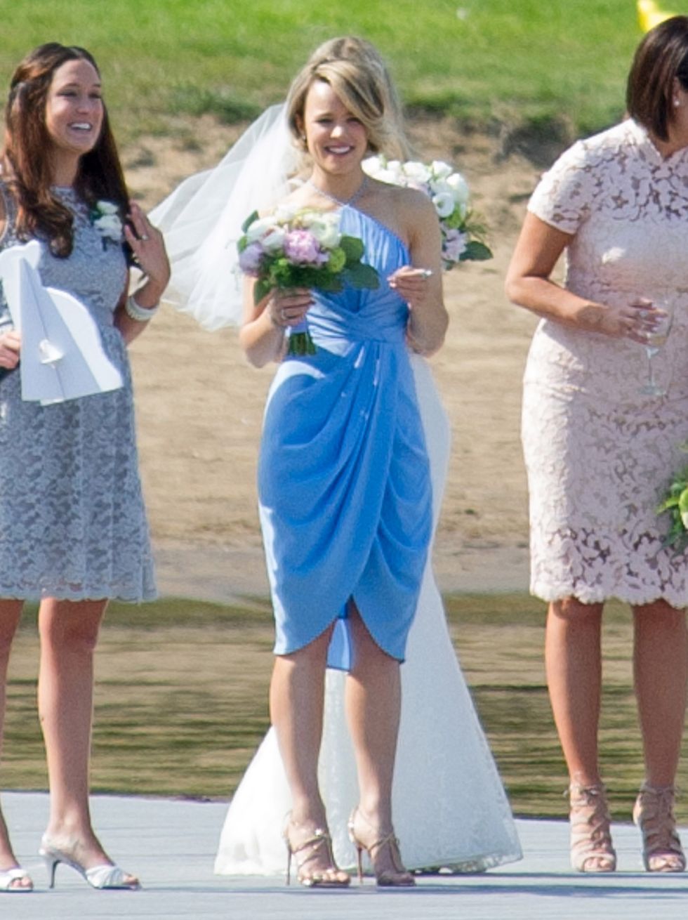 Rachel McAdams wears a blue bridesmaid dress at her sister's wedding