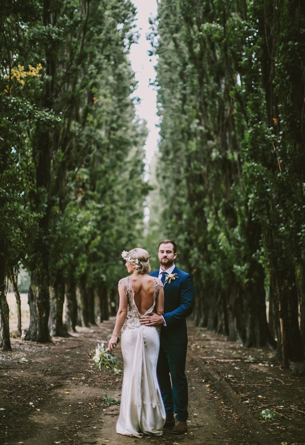 Dress, Trousers, Coat, Photograph, Bridal clothing, Outerwear, People in nature, Forest, Bride, Wedding dress, 