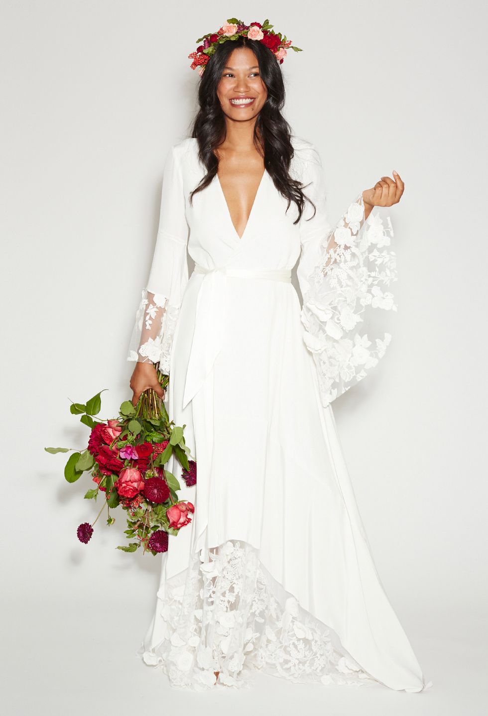 Clothing, Sleeve, Dress, Petal, Shoulder, Textile, Bridal clothing, Photograph, White, Formal wear, 