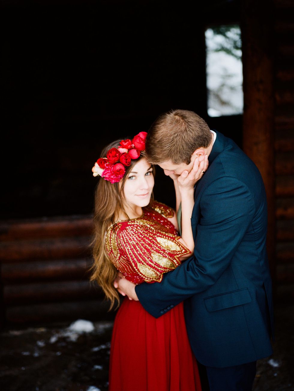 Red, Dress, Interaction, Love, Romance, Headpiece, Hair accessory, Flash photography, Tradition, Cut flowers, 