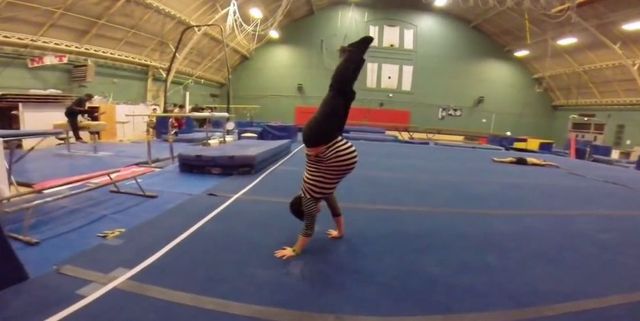 This woman is 8 months pregnant with twins and is SO GOOD at gymnastics