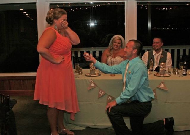 Upstaging wedding couple proposing during a wedding