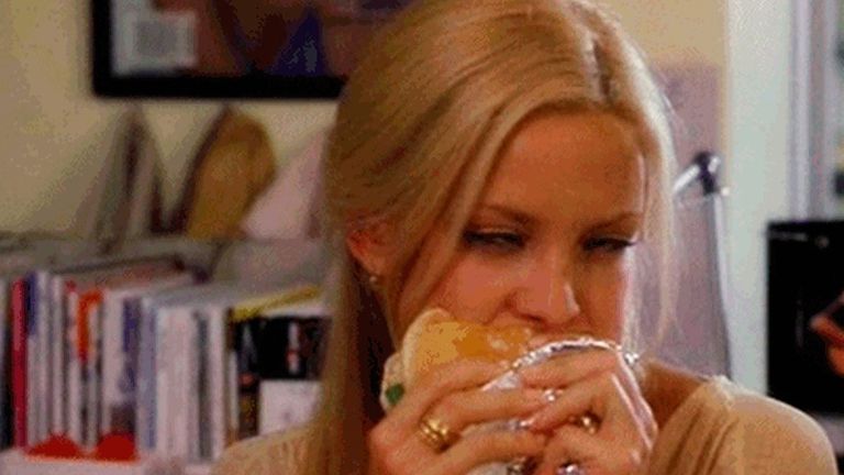 Kate Hudson eating a sandwich