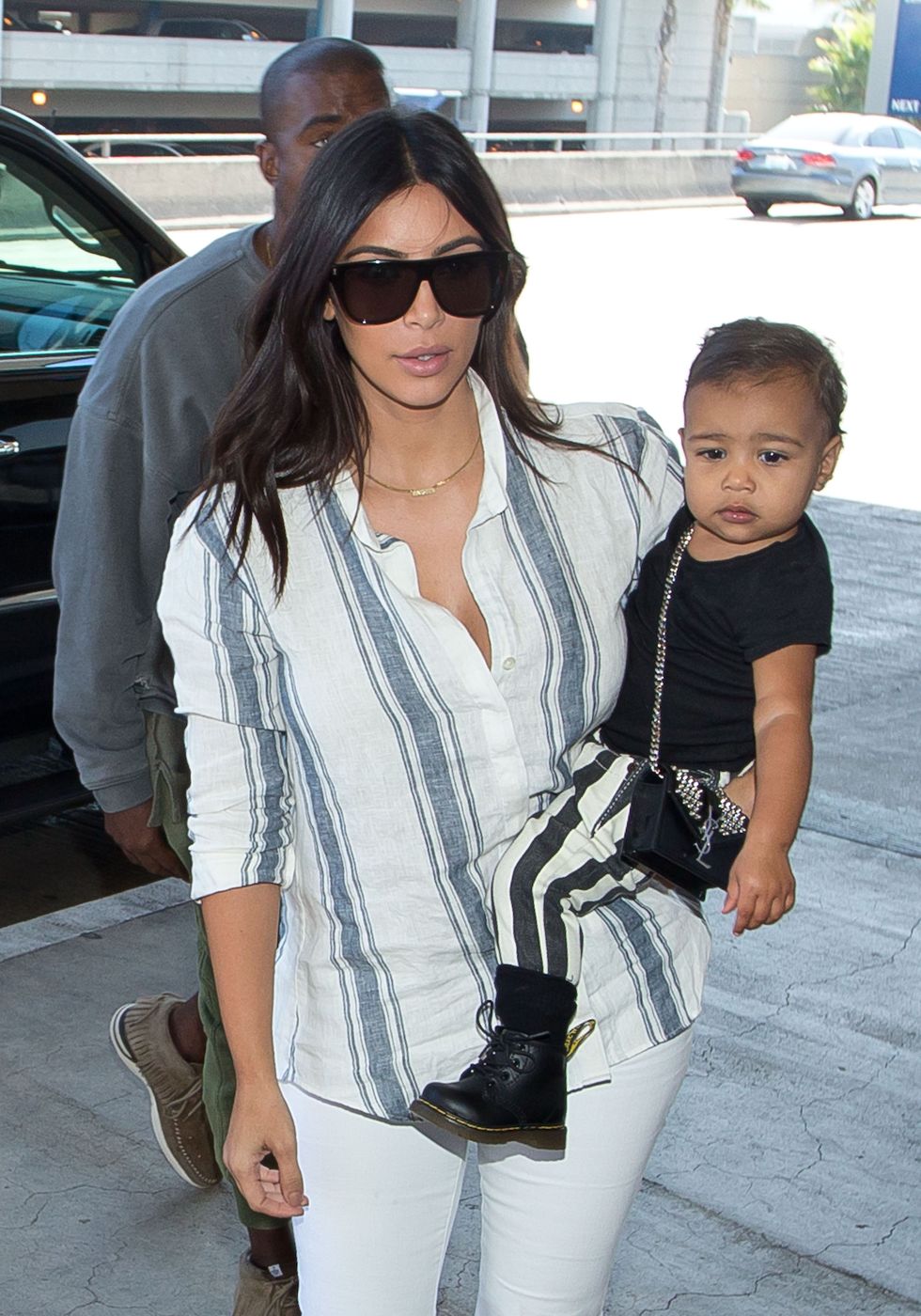 Kim Kardashian and North West wearing stripes