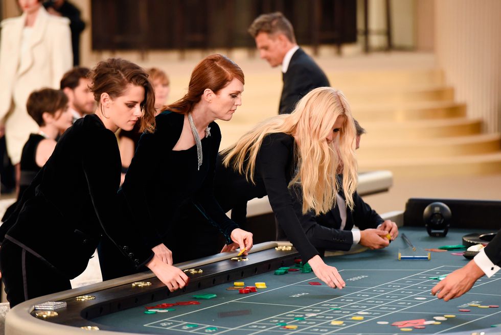 Kristen Stewart, Julianne Moore and Lara Stone gambling at Chanel AW15