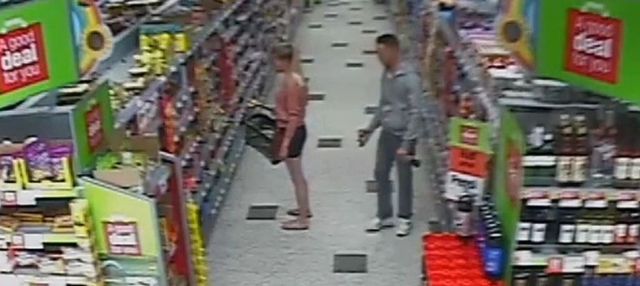 Guy taking photos of girl's bum in the supermarket