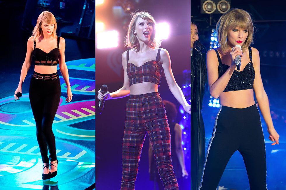Taylor Swift wearing bralet and fitted trousers on stage