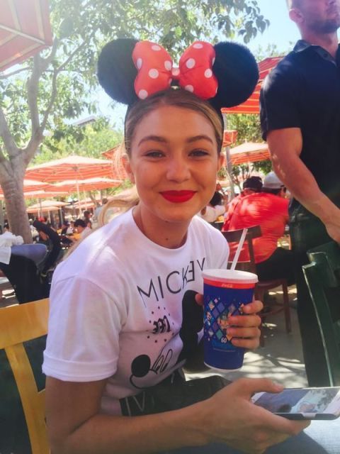 Gigi Hadid wearing minnie mouse ears at Disneyland