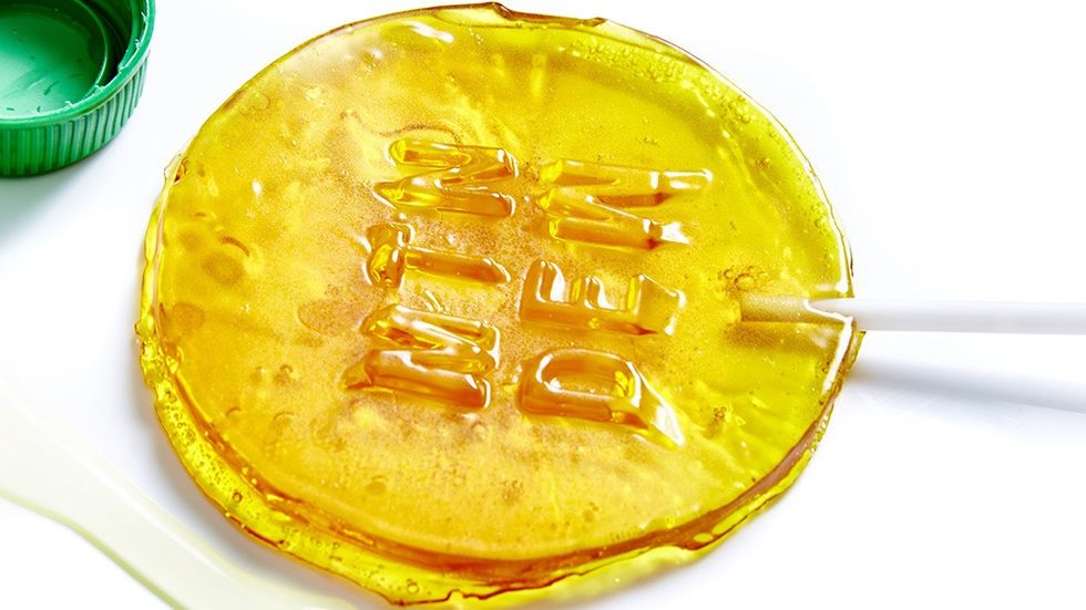 Yellow, Amber, Metal, Brass, Amber, Dessert, Baked goods, Snack, Circuit component, Gold, 