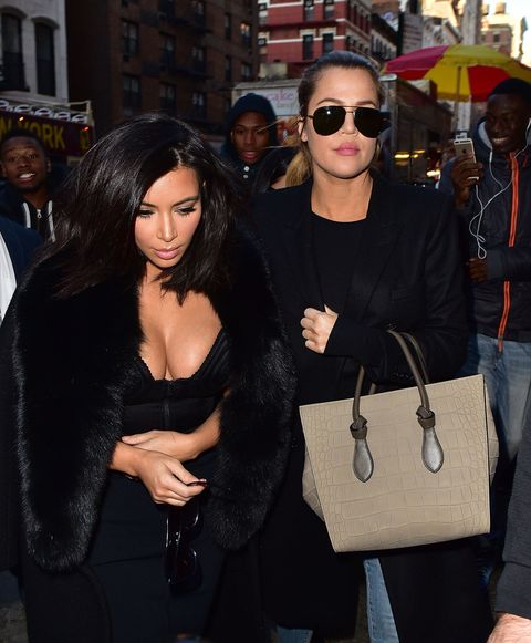 Kim and Khloe Kardashian match in all black outfits