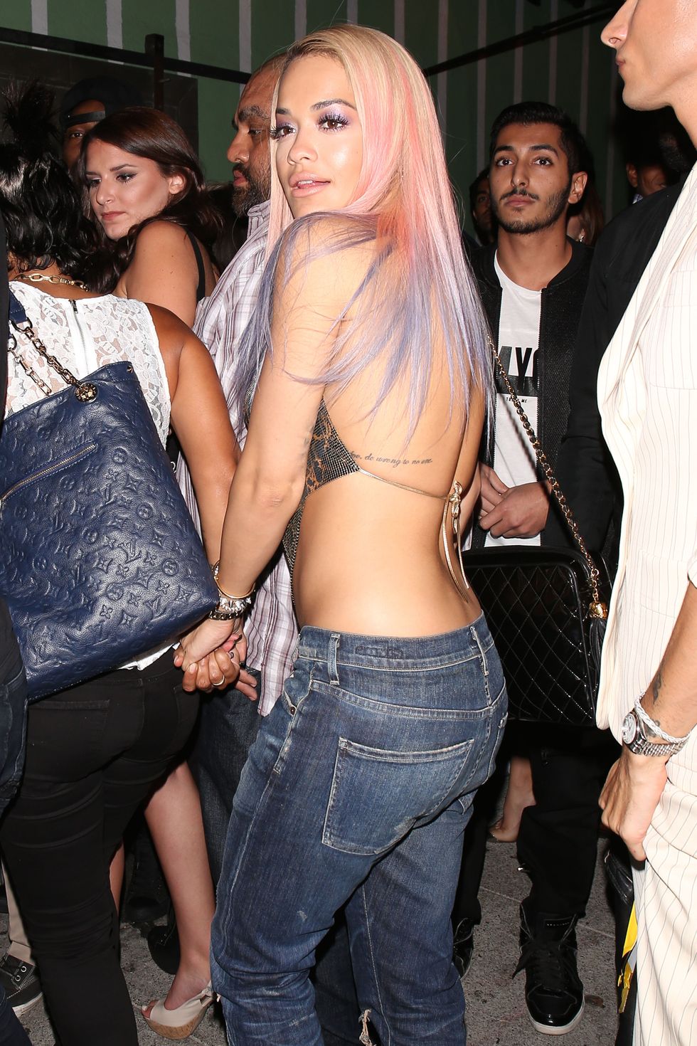 Rita Ora swishing her pink and blue hair all around