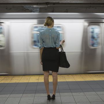 Woman waiting on a train platform