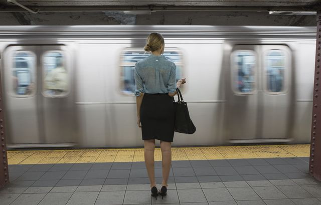 Woman waiting on a train platform