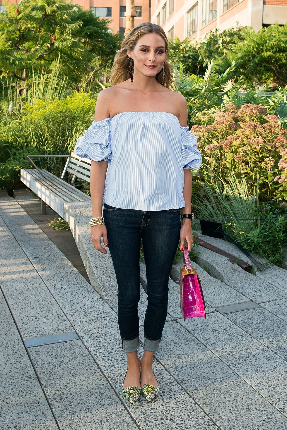 Olivia Palermo wearing cropped jeans and an off-the-shoulder top