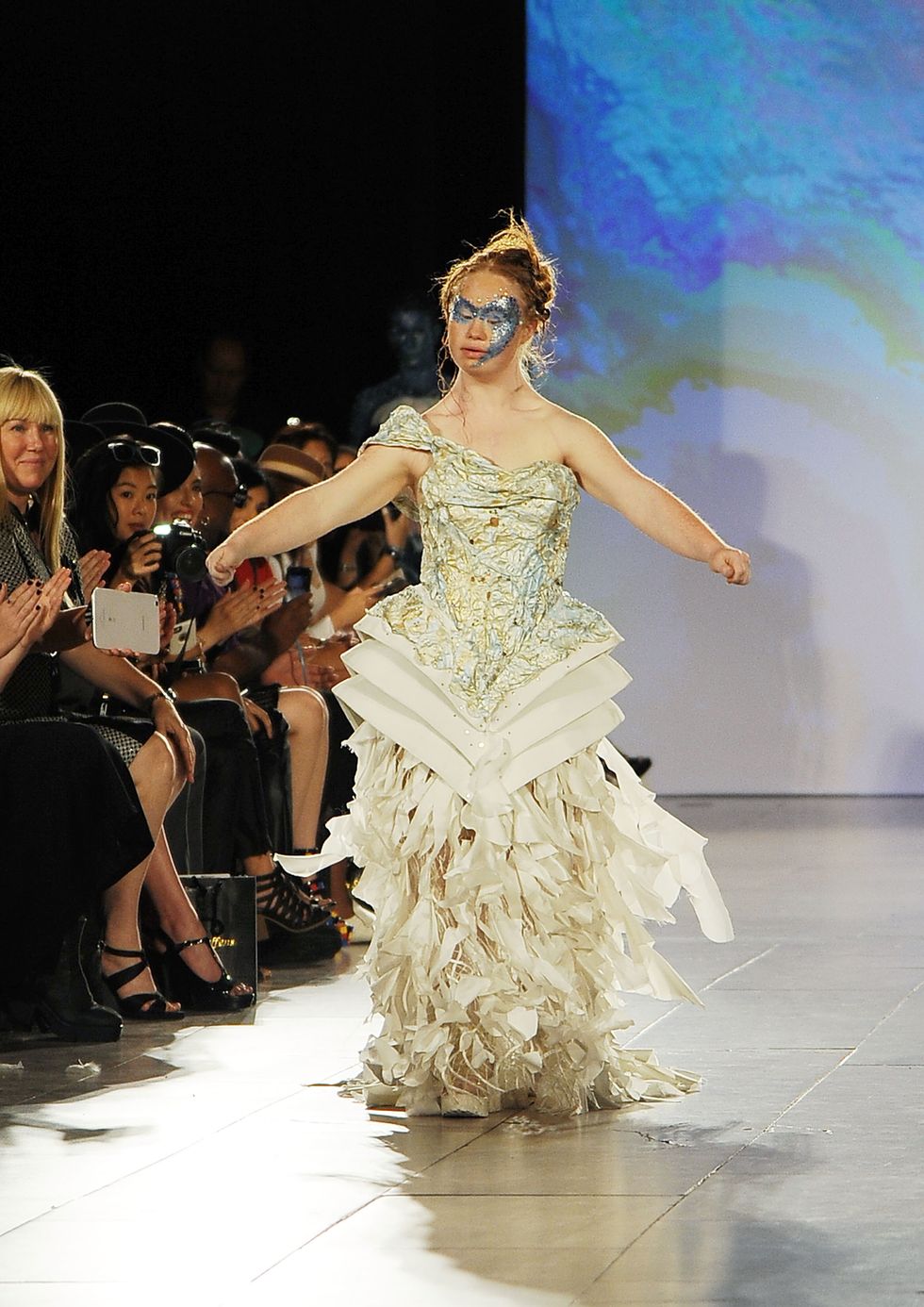 Madeline Stuart models a beautiful couture gown on the catwalk at New York Fashion Week