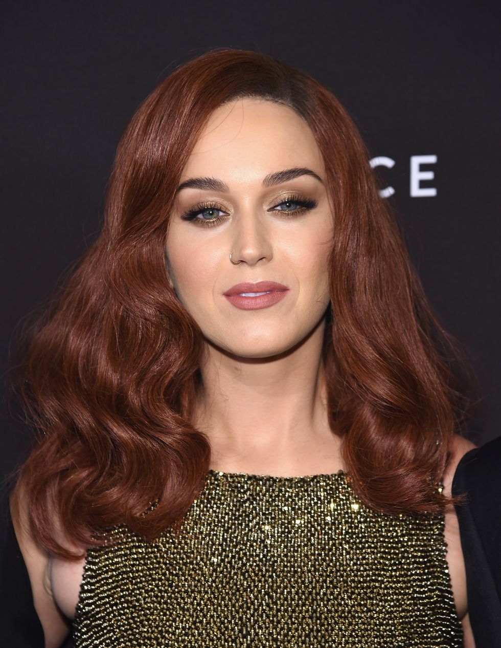 Katy Perry debuts auburn hair