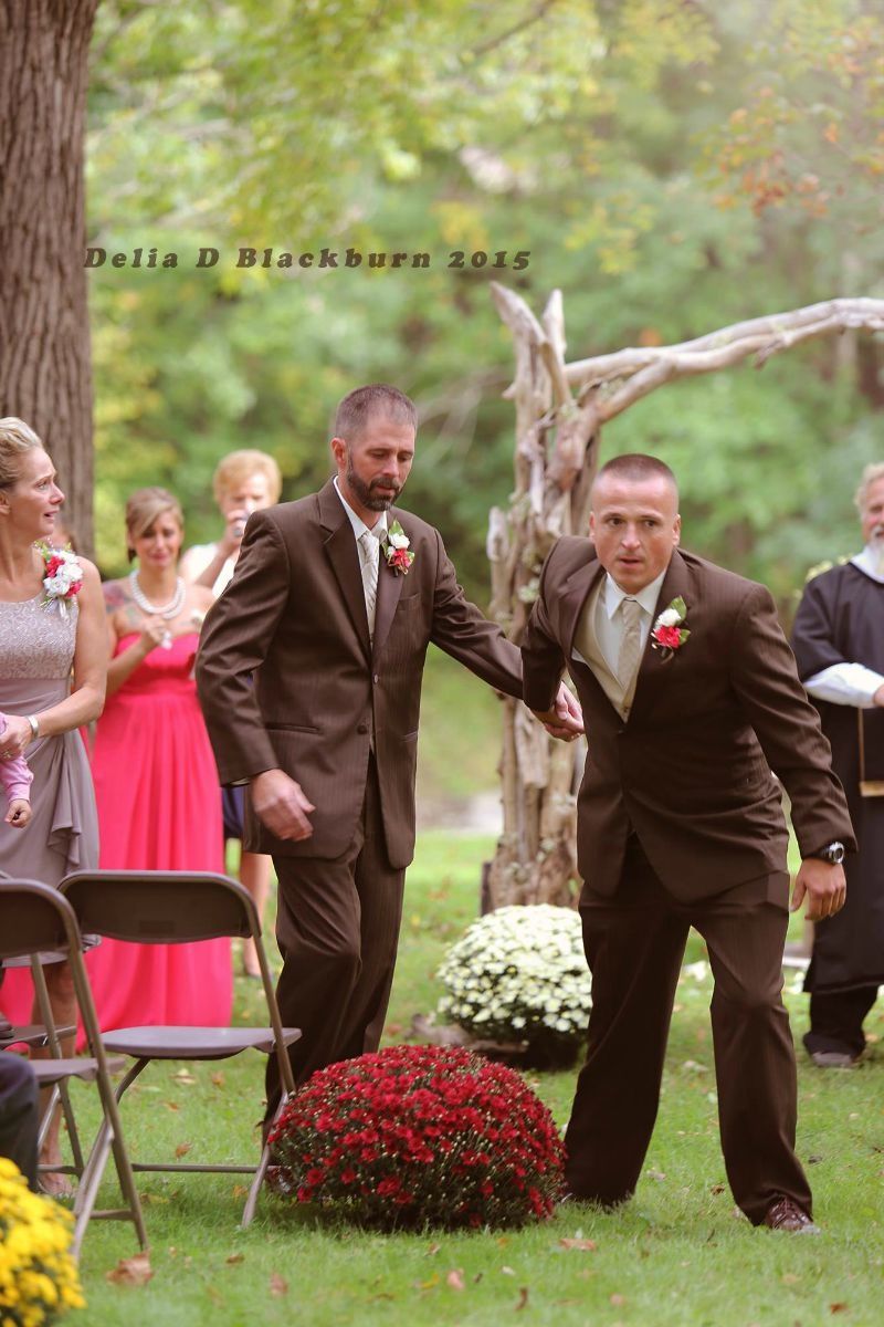 Dad and stepdad walk bride down the aisle