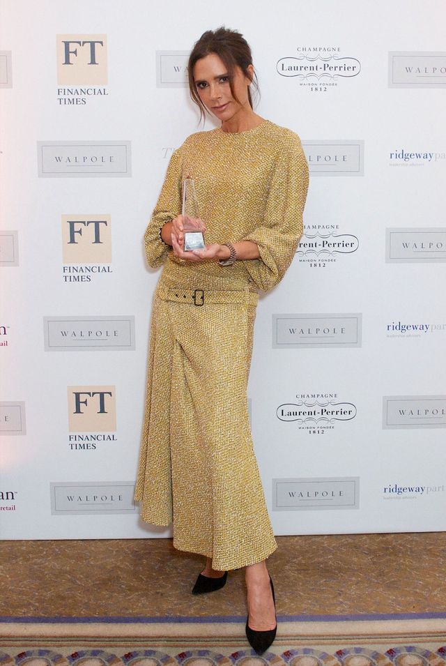Victoria Beckham wearing a golden knitted co-ord
