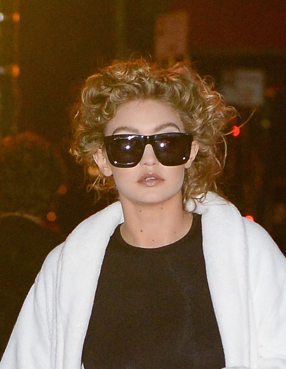 Gigi Hadid steps out with a very curly, very short hairdo