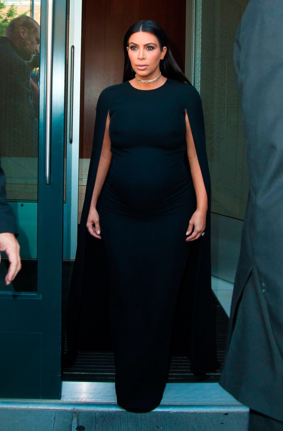 Kim Kardashian wearing Valentino black cape dress