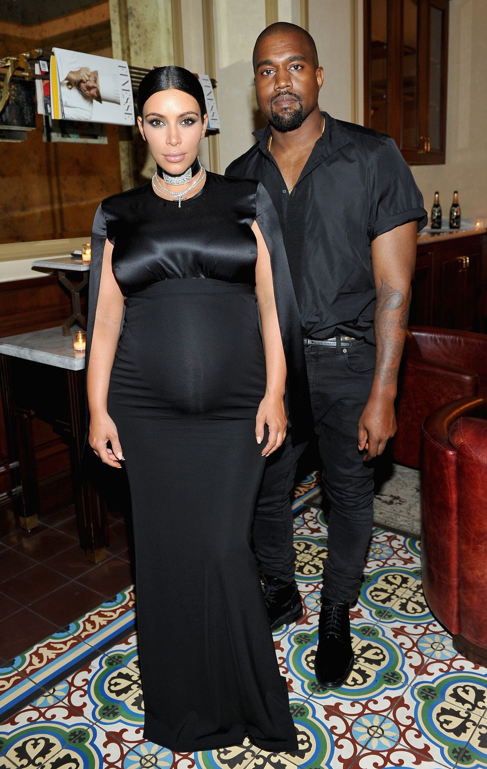 Kim Kardashian wearing a black evening gown