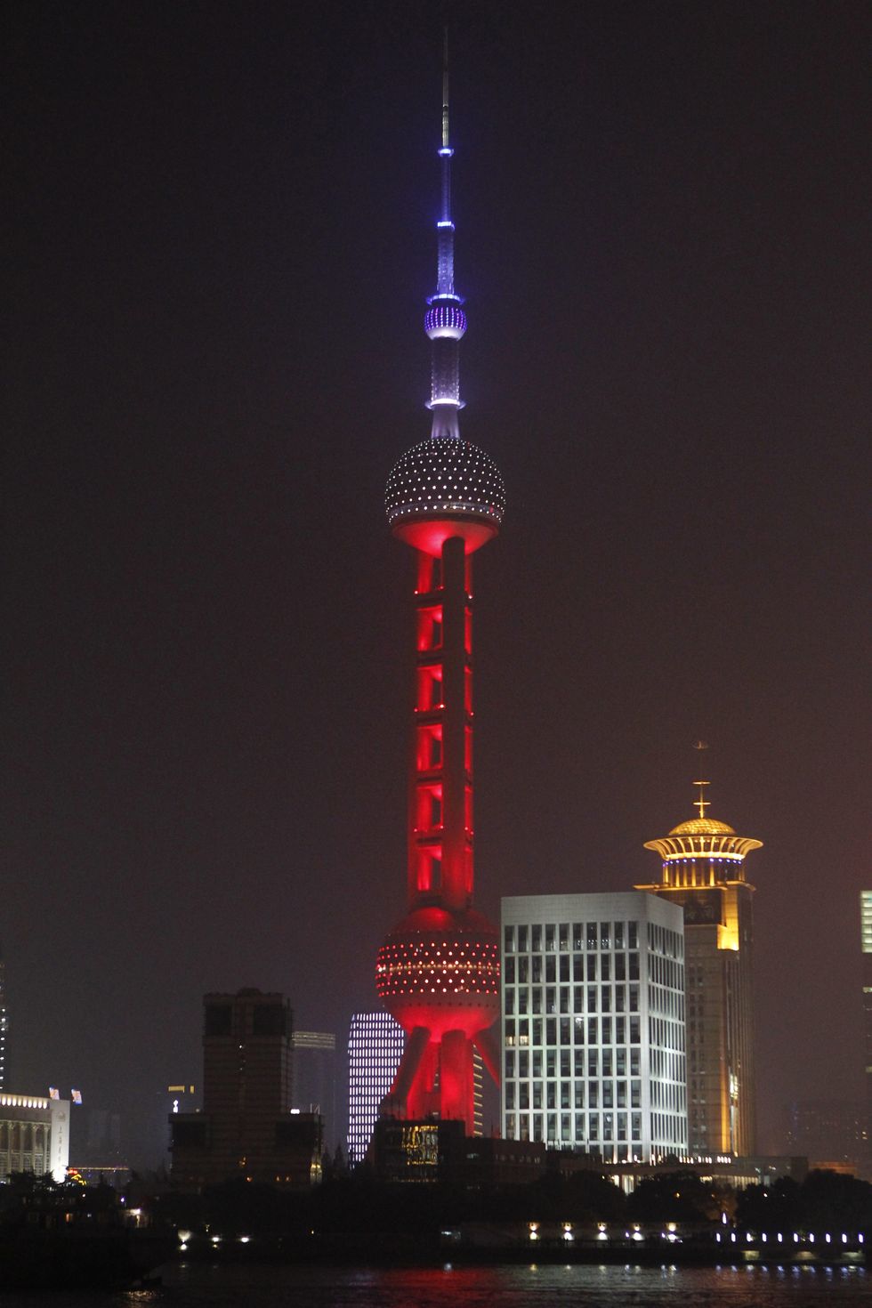 Photos of the world's solidarity following the Paris attacks - Oriental Pearl Tower, Shanghai, China