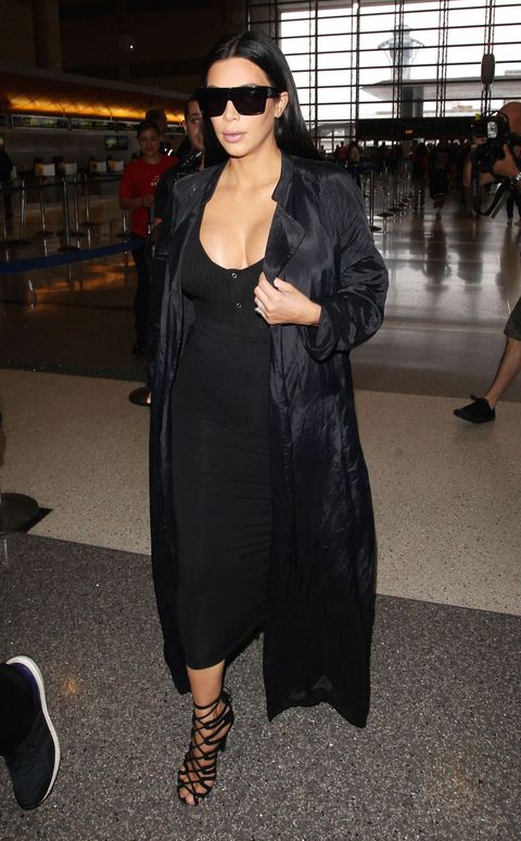 Kim Kardashian wearing all black in the airport