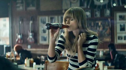 Taylor Swift with a diet coke