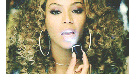 Beyonce putting on makeup