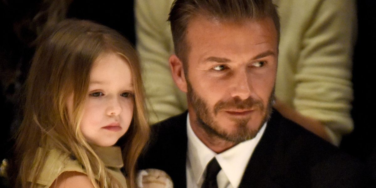 David Beckham stitches dolly dresses for Harper