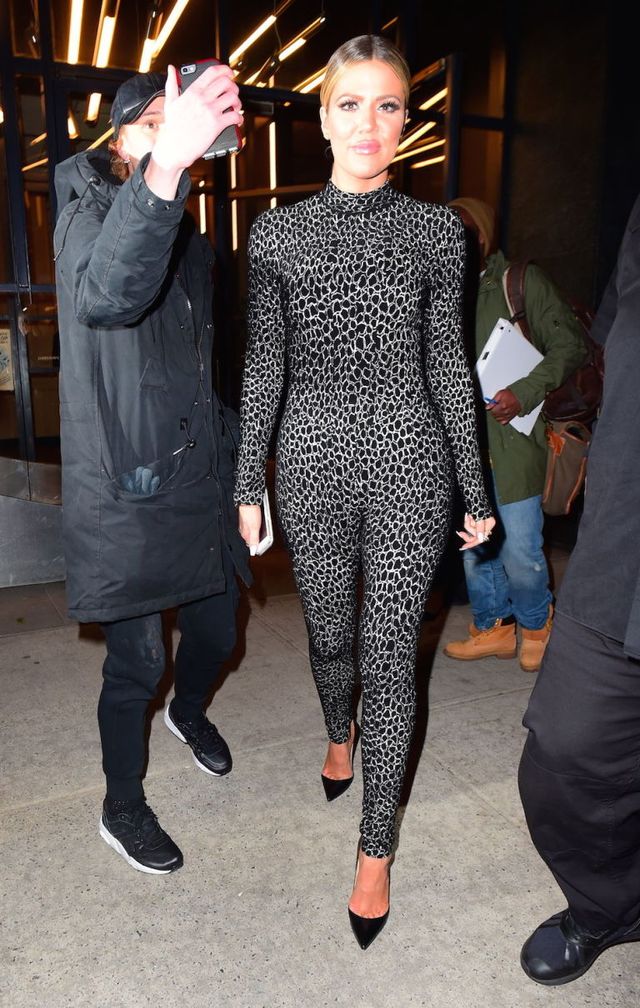 Khloe Kardashian wearing a printed catsuit