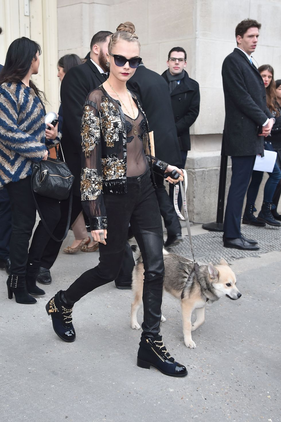 Cara Delevingne with her dog Leo at Fashion Week