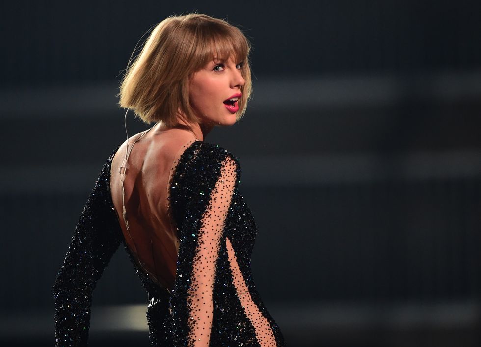Taylor Swift performs onstage during the 58th Annual Grammy music Awards